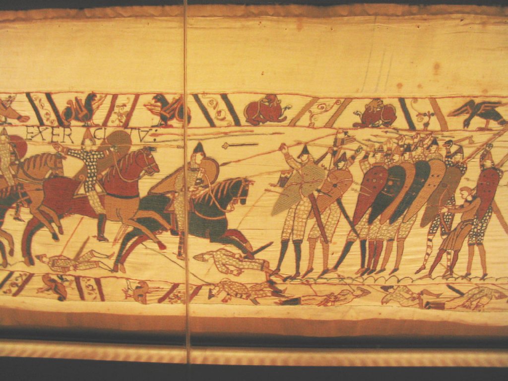 Bayeux Tapestry scene showing Norman cavalry attacking the Anglo-Saxon shield wall at Hastings